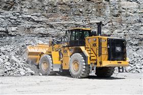 Hilltop Quarry: A Caterpillar 988K sorts material in the pit. 