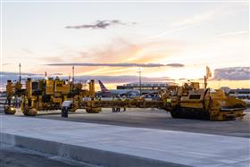 Haines & Kibblehouse, Inc.: The Gomaco concrete paving spread is staged for work at Philadelphia International Airport. 