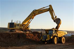 Site & Land Development: A Komatsu PC1250 and a Komatsu HD605 work on a mass excavation site in Myerstown, PA.